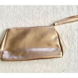 Nordstrom‘s Rose gold cosmetic bag with tassel